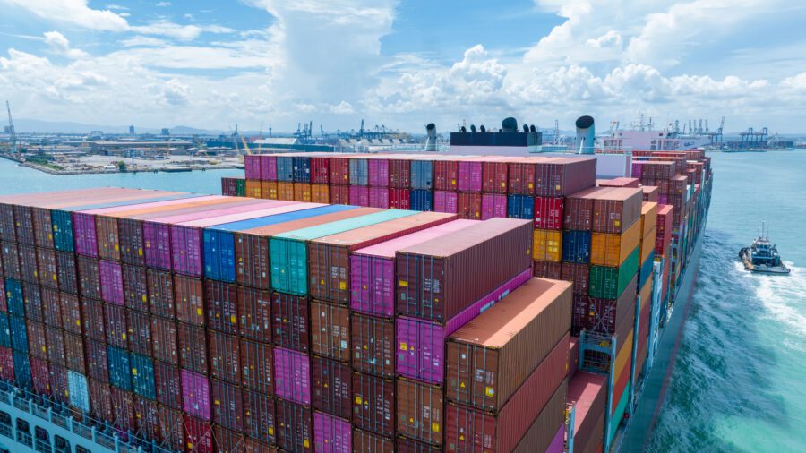 A large cargo ship filled with shipping containers